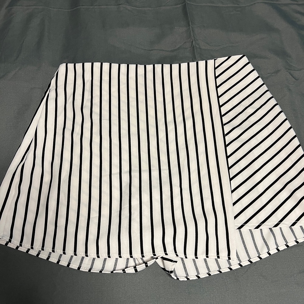 Never worn. Asymmetrical skort